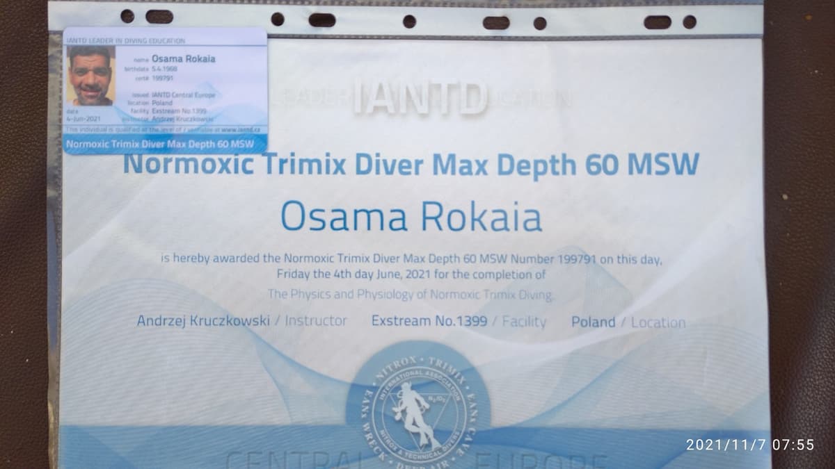 IANTD Normoxic Trimix Diver Max Depth 60 MSW certificate for Osama Rokaia, dated 4 June 2021, instructor Andrzej Kruczkowski, Exstream No.1399 facility, IANTD ID card with photo attached